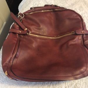 Maroon and gold backpack